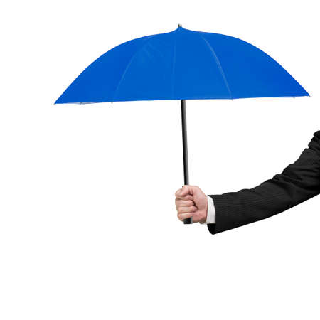 Hand holding blue umbrella, isolated on white background.の写真素材