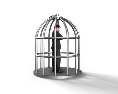 Cage with man thinking inside, isolated on white.の写真素材