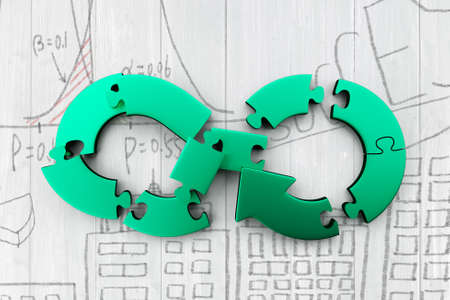Circular economy concept. Green arrow infinity symbol of jigsaw puzzle separated in small pieces, on doodles wooden wall background.の写真素材