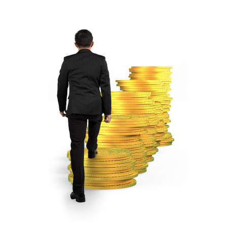 Rear view of businessman climbing up the step stairs of golden coins stacks, isolated on white background, concept of business financial growth success.の写真素材
