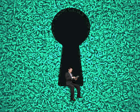 Businessman using digital tablet and sitting in keyhole with numbers and letters background