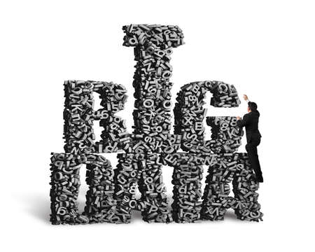 Big data, information analysis and restructuring concept. Businessman climbing on gray 3D letters and numbers in BIG DATA words shape, isolated on white background.の写真素材