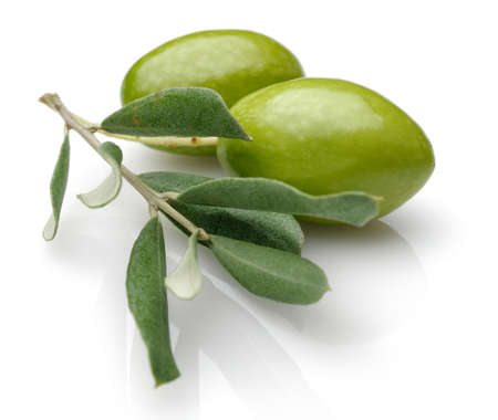 Green Olive with green leaves isolated on white background.の写真素材