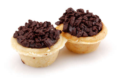 Chocolate cupcake on isolated white backgroundの写真素材