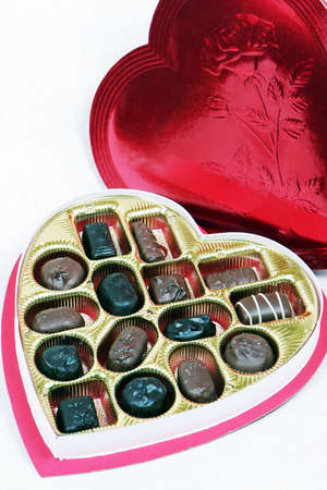 Open heart shaped box of chocolatesの写真素材