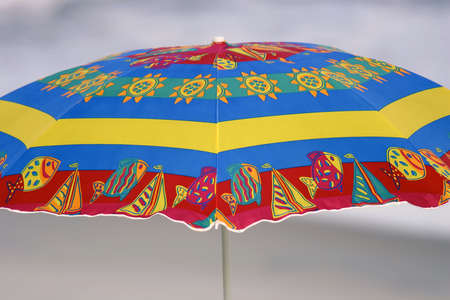 Colorful beach umbrella closeup.の写真素材