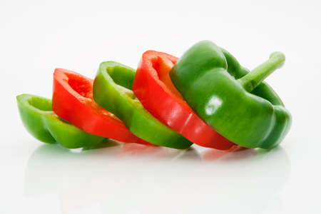 Sliced sweet peppers on a white backgroundの写真素材