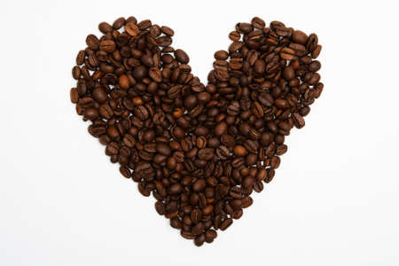 Heart shape from coffee beansの写真素材