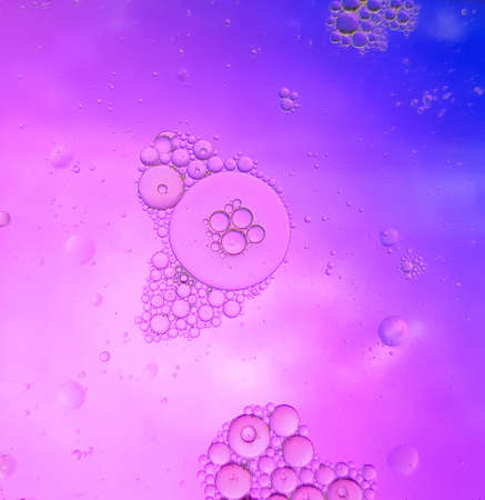 Colorful Oil Bubbles in Waterの写真素材