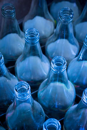 Close up used bottles waiting for reuse
