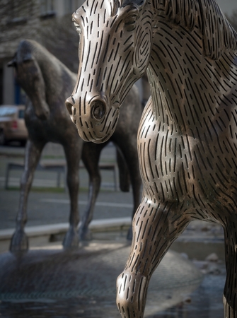 PRAGUE - MAY 3, 2017: Bronze sculptural group of horses from Michal Gabriel, mounted on a water cascade on the square between the streets of Kafka - Wuchterlova in Prague Dejvice.のeditorial素材