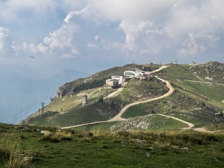 MALCESINE, ITALY â AUGUST 27  2019:  Monte baldo mountain with buildings of upper station of cableway.のeditorial素材
