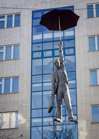 PRAGUE - FEBRUARY 10, 2020: Sculpture of man with umbrella from instalation of Slight Uncertainty of Michal Trpak.のeditorial素材