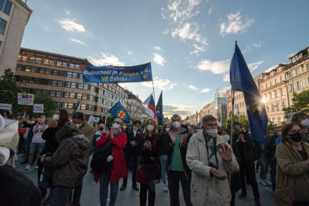 PRAGUE - MAY 20, 2021: Protest of five thousand on Wenceslas Square. People called for the prosecution of the president Zeman for treason and resignation of M. Benesova, Minister of Justice.のeditorial素材