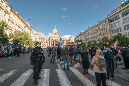 PRAGUE - MAY 20, 2021: Protest of five thousand on Wenceslas Square. People called for the prosecution of the president Zeman for treason and resignation of M. Benesova, Minister of Justice.のeditorial素材