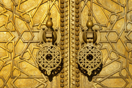 Morocco. Fez. The royal palace founded by the Merinids in 1320. It opens onto the Place des Alaouites through huge doors chiseled in copper made by a local craftsman around 1970.のeditorial素材