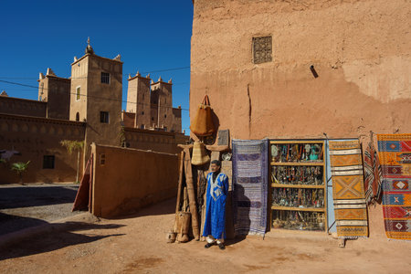 North Africa. Morocco. The seller in front of his souvenir shop at the old ruined kasbah of Tamdaghtのeditorial素材
