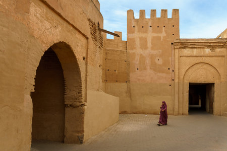 North Africa. Morocco. Taroudant. A woman in a chador in front of the city wallsのeditorial素材