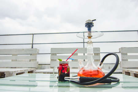 Hookah smoke in cafe & lounge bar