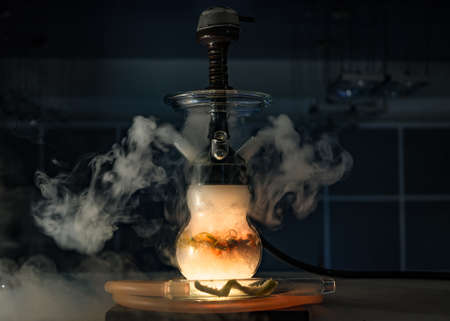 Hookah smoke in cafe & lounge bar