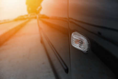 One side of a black carの写真素材