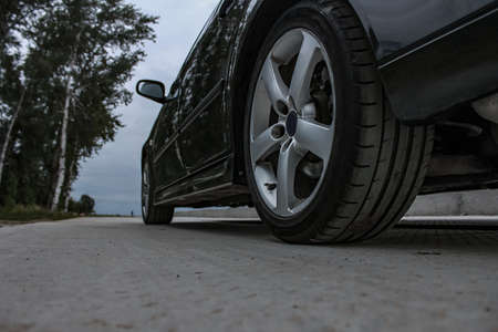 One side of a black carの写真素材