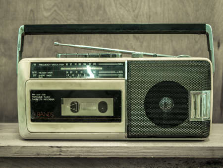 Vintage radio on wall backgroundの写真素材