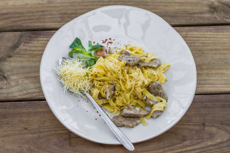 Tasty pasta with mushrooms and sauceの写真素材
