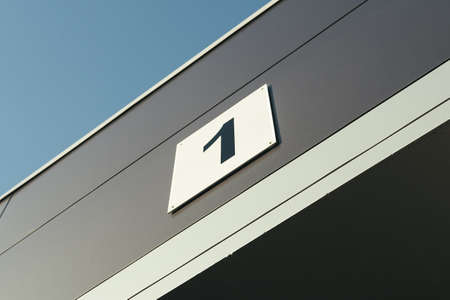 Entering the car garage with the numberの写真素材