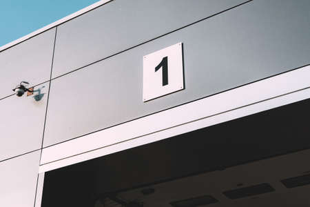 Entering the car garage with the numberの写真素材