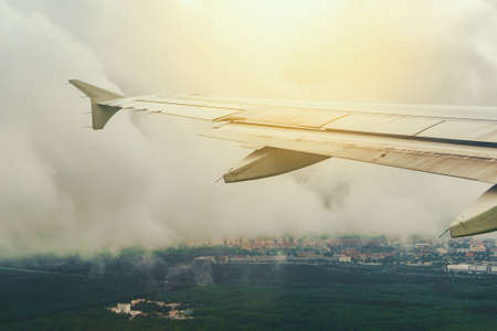 The plane approaching the view from the porthole