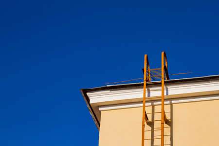 The staircase to the roof of the building, the corner of the house