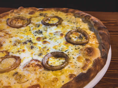 Hot delicious pizza freshly cooked in a cafeの写真素材