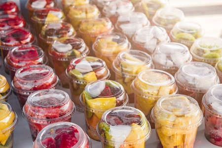 Fruit platter in cups on the counter in the market