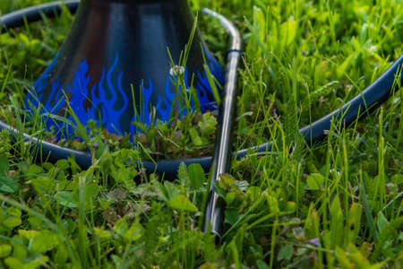 Hookah on the grass on a picnic in nature