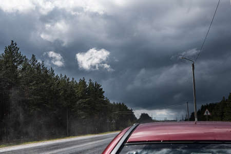 Raw road during the rain on a summer dayの写真素材
