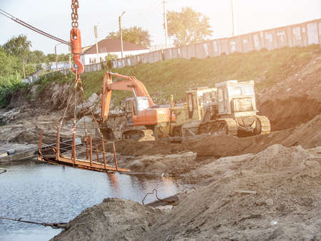 Construction machinery on the construction site summer dayの写真素材