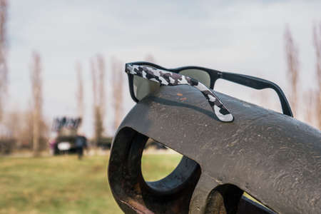 sunglasses on the artillery gun spring day