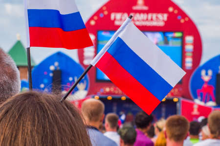 Fan Zone FIFA 2018 & Fans in the headgear in the colors of the Russian flag.のeditorial素材