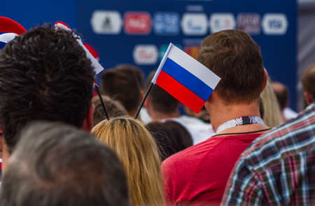 Fan Zone FIFA 2018 & Fans in the headgear in the colors of the Russian flag.のeditorial素材