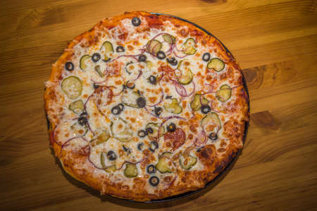 Very tasty fresh pizza from the pizzeria. Various fillingsの写真素材