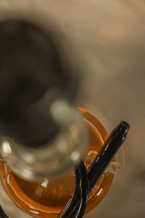 New Glass Hookah with beautiful backlight in the cafe. Hookah barの写真素材