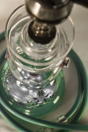 New Glass Hookah with beautiful backlight in the cafe. Hookah bar