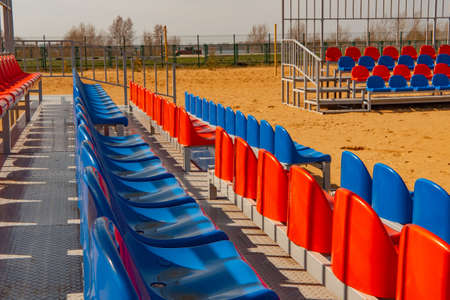 Beach volleyball court with spectator stands. without people. sunny summer day