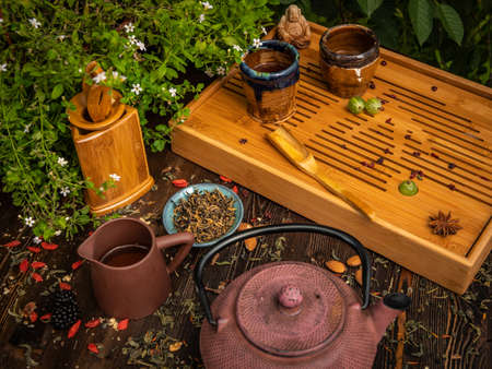 Preparation of the tea ceremony, tea in the bowl. Handmade cups.