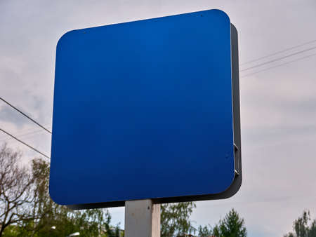 Blue street sign on an iron pipe for placing information. Dayの写真素材