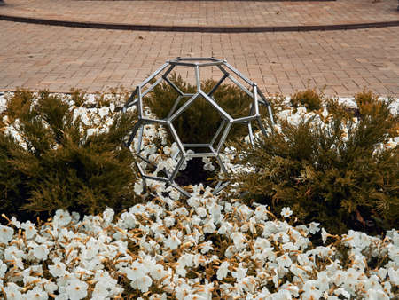 Installation flower bed in the form of a soccer ball. Summerの写真素材