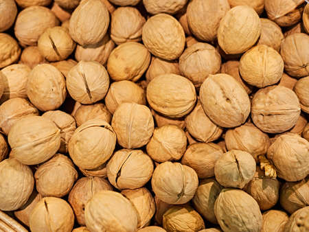 Walnuts on a store counter. Nuts and Dried Fruits Store