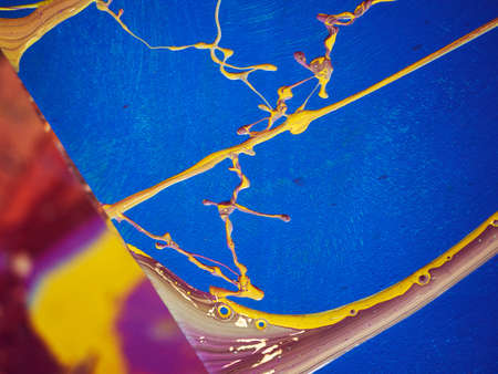 Texture of blue paint drawing on canvas using a pendulum.の写真素材