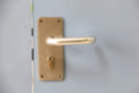 hand hold handle of door ,blurry backgroundの写真素材